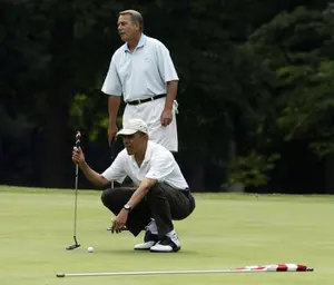 Casually Crashing America and Fomenting Foreign Wars, all while appearing disinterested.