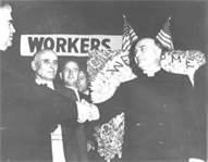 Bishop Sheil and John L. Lewis, on stage together, at the infamous Alinskyite political rally. Bishop Sheil and John L. Lewis, on stage together, at the infamous Alinskyite political rally.